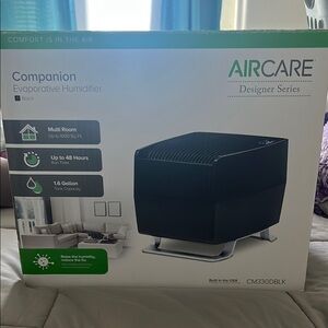 AIRCARE Black Evaporative Humidifier Brand New. Never been opened!
